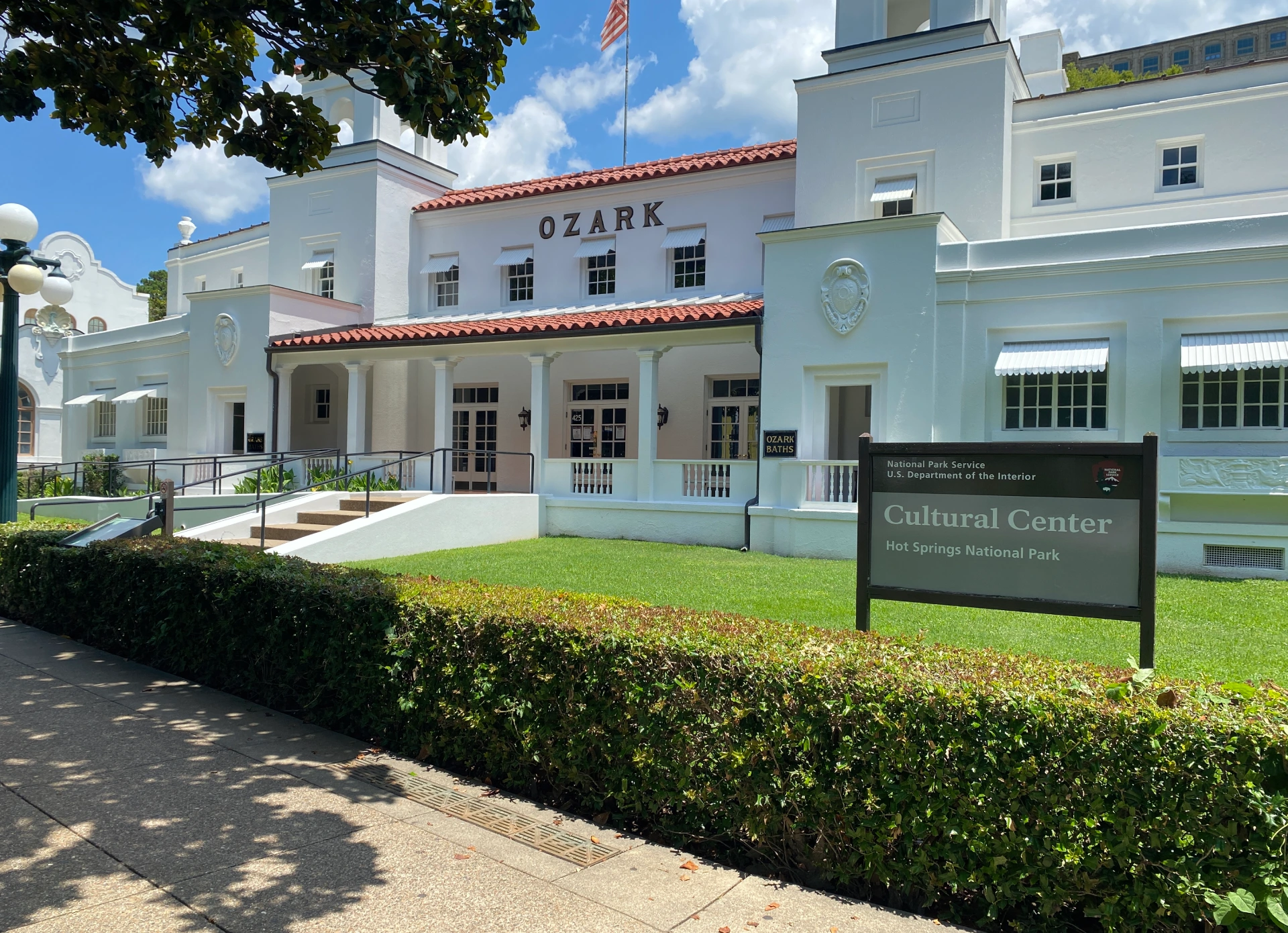 Exterior of the historic Ozark Theatre on a sunny day.